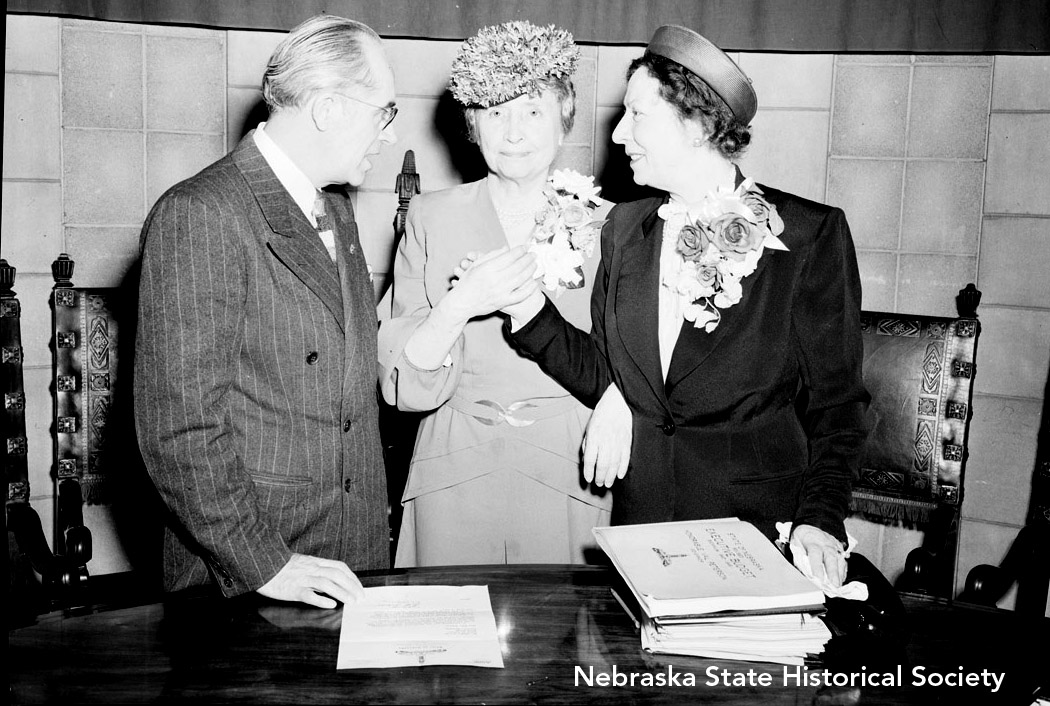 Unidentified man with Helen Keller and her secretary, Polly Thompson during her visit to Lincoln on May 12, 1947. Thompson communicated with Keller by touch. RG2183.PH001947-00512-2