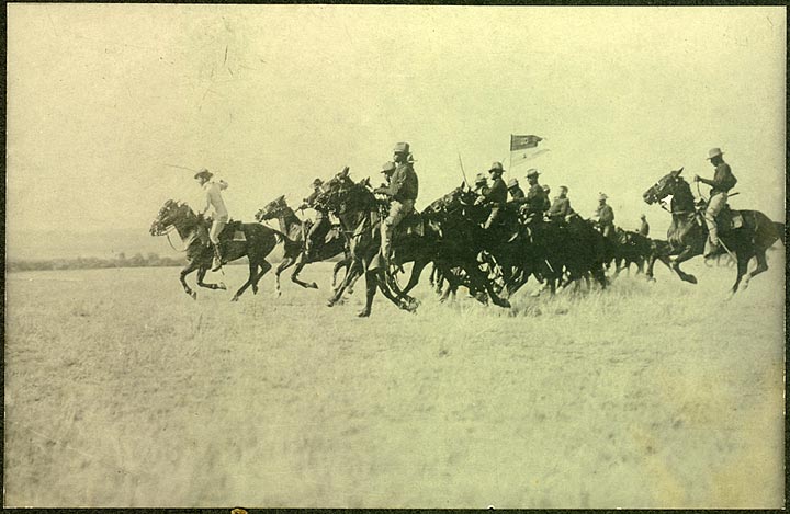 Troop I, Tenth Cavalry at full gallop, Fort Robinson, about 1904. 