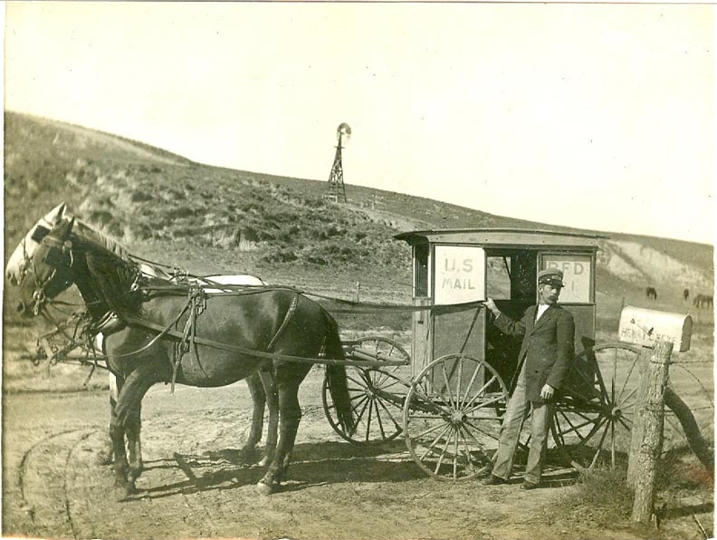 J.W. Thompson with mail wagon