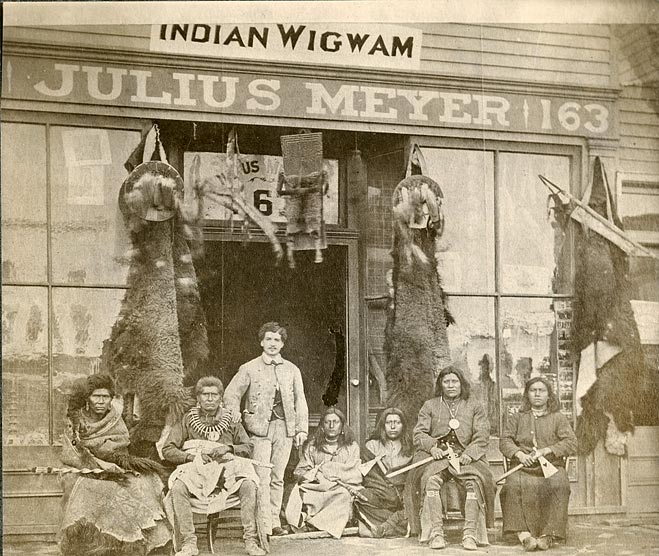 Julius Meyer in front of his store at 163 Farnam Street, Omaha, Nebraska, about 1875.