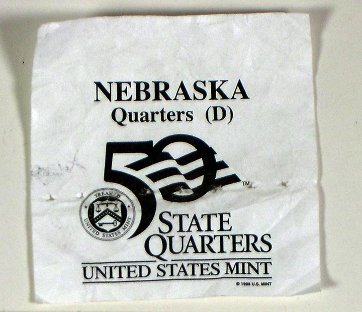 Canvas bag with tag in which 000 of loose Nebraska Quarters were delivered NSHS 11055-2918