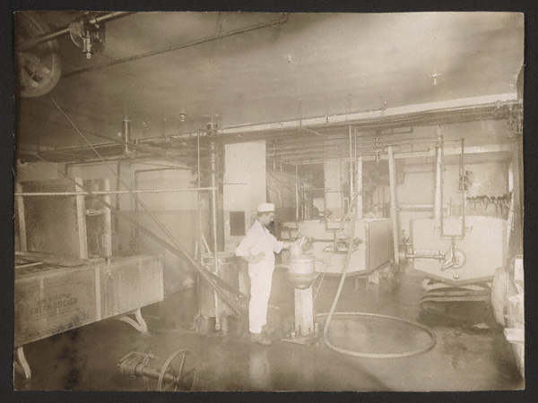 Checking the temperature of the cream, Omaha plant, 1911 (RG4218.PH1-14) 