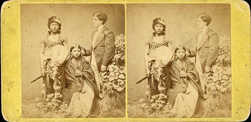 Stereoview showing Meyer with an unidentified man, woman, and child, possibly Poncas