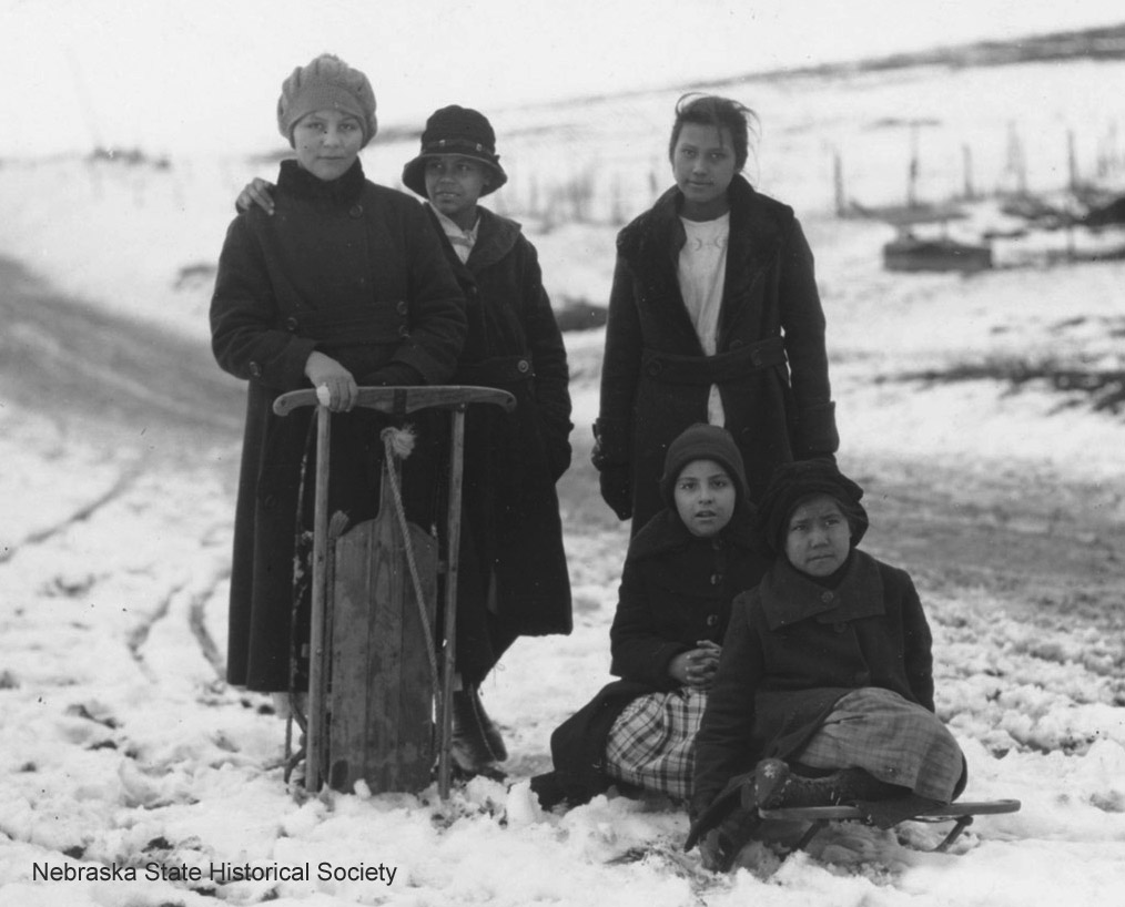 Five Winnebago children with sleds (RG2010.PH0-000025)