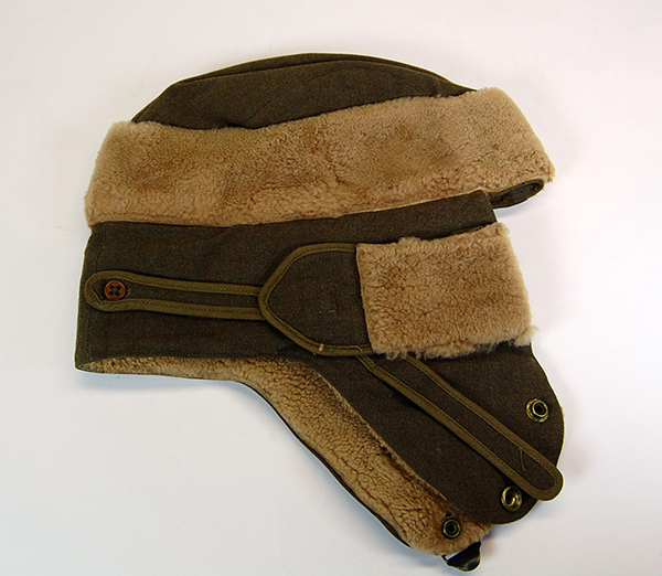 Cold-weather military cap used at Fort Robinson by 1st Lt. Robert H. McCaffree during World War II. The fort housed a prisoner-of-war camp and a war dog training facility. NSHS RG11475-1