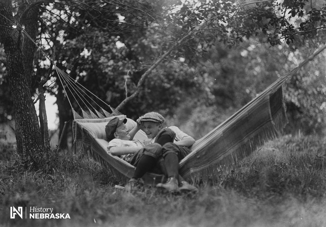 Two boys in a hammock, ca. 1915 (RG2836.PH0-000189)