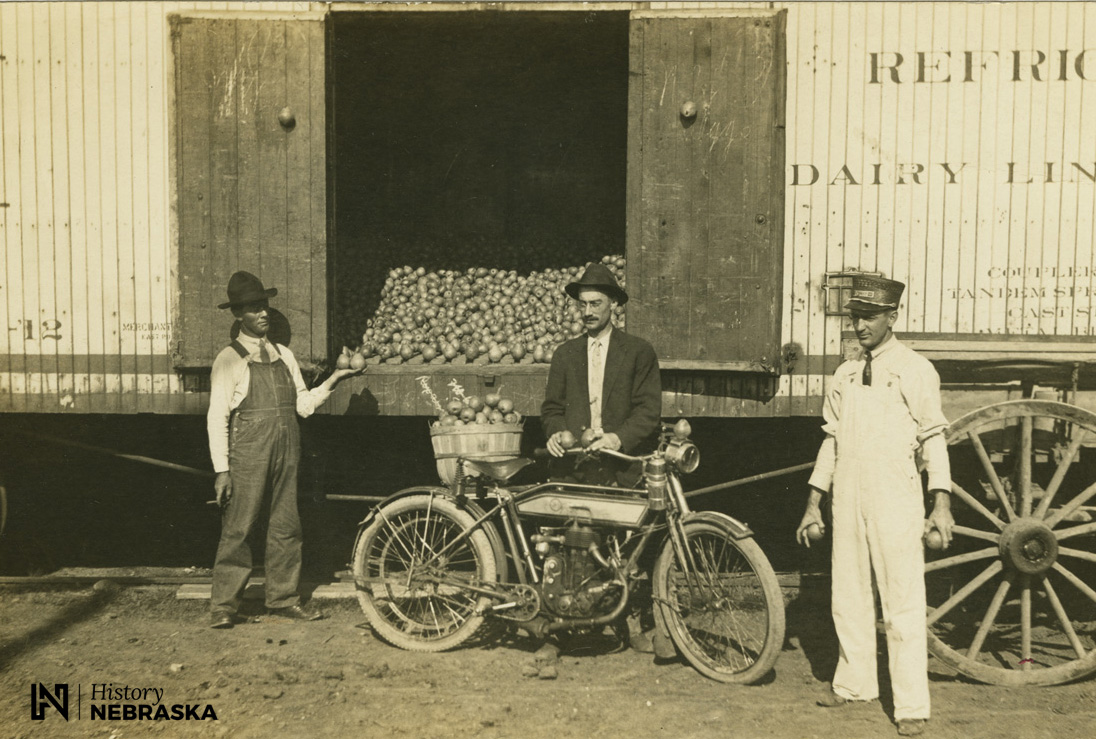 Selling pears from a train car (RG3372.PH000013-000019)