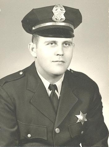 black and white photo of Jerry Sample in police uniform