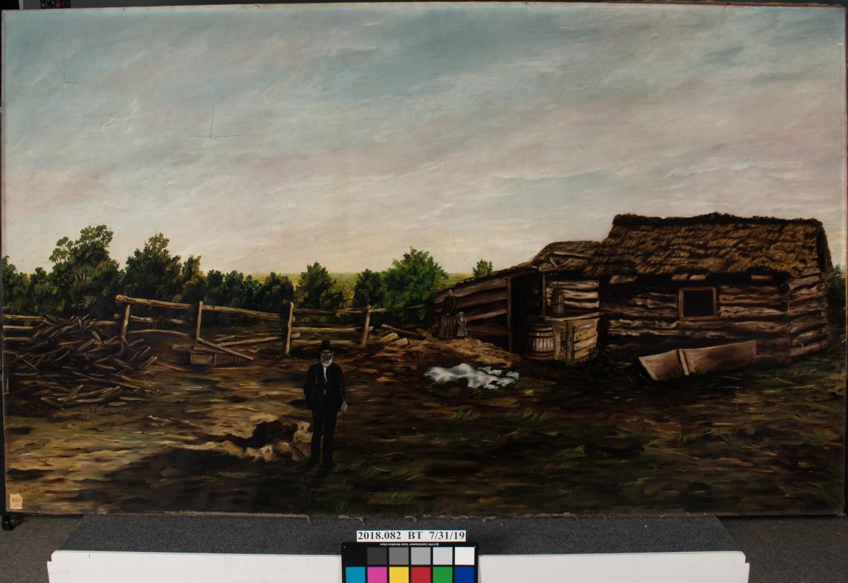 painting of man in front of log cabin, fencing and trees in the left background, woman and child stand at center background
