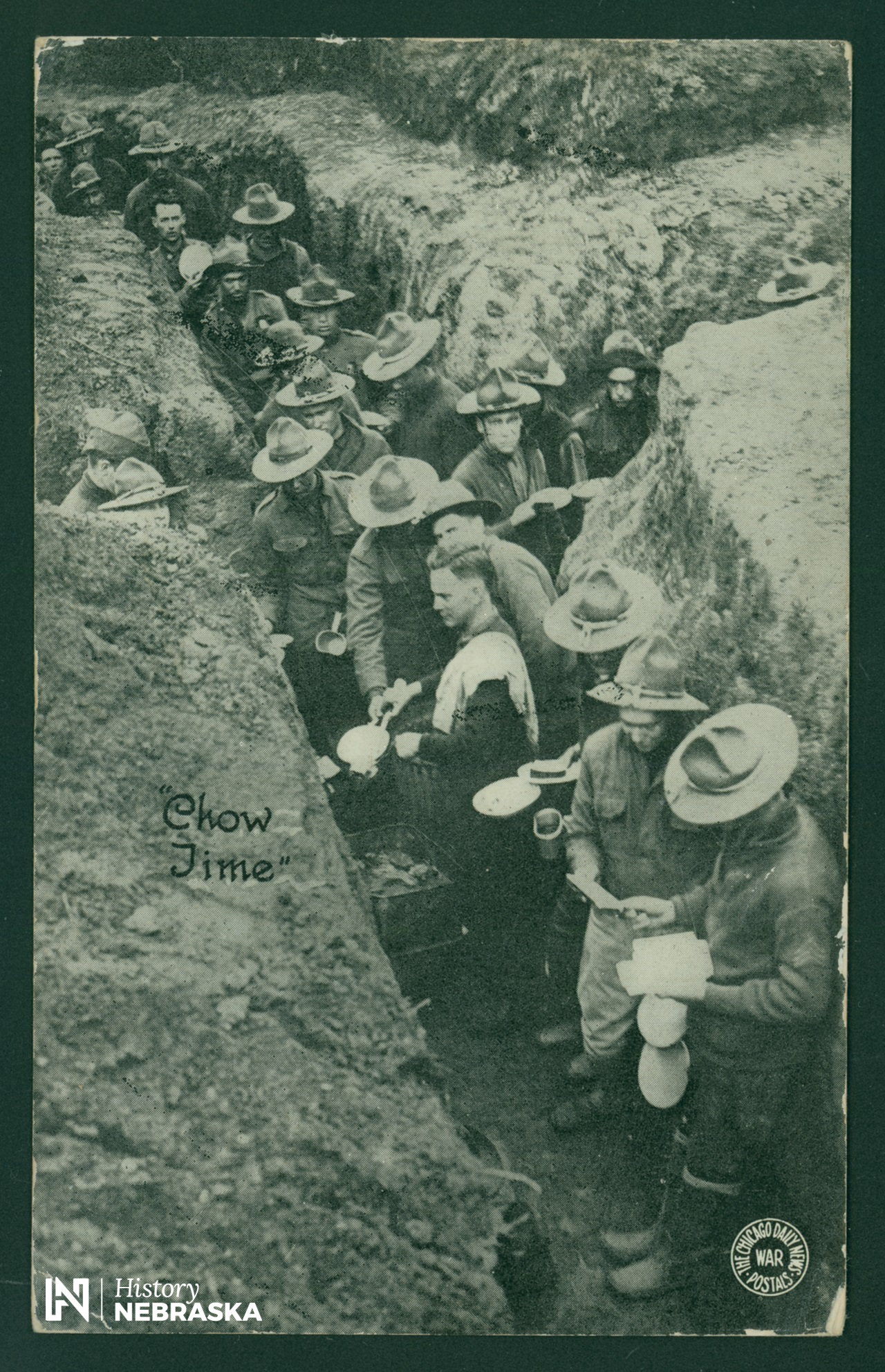 Chow time for World War I soldiers in a trench.