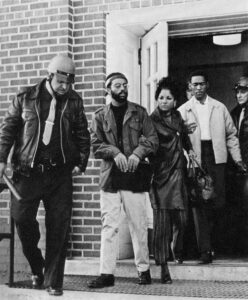 (Police arrest BLAC sit-in protestors, November 7, 1969. - Tomahawk 1970 yearbook, 65.)