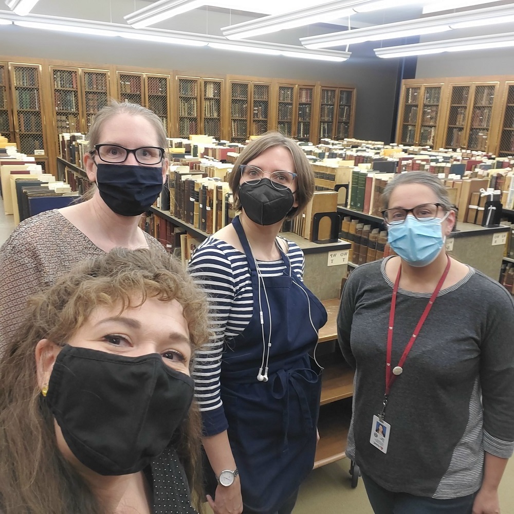 Hilary LeFevere, Vonnda Shaw, Megan Griffiths (Conservation Technician), and UNMC Rare Book Librarian Erin Torell, mark the end of three weeks worth of work!