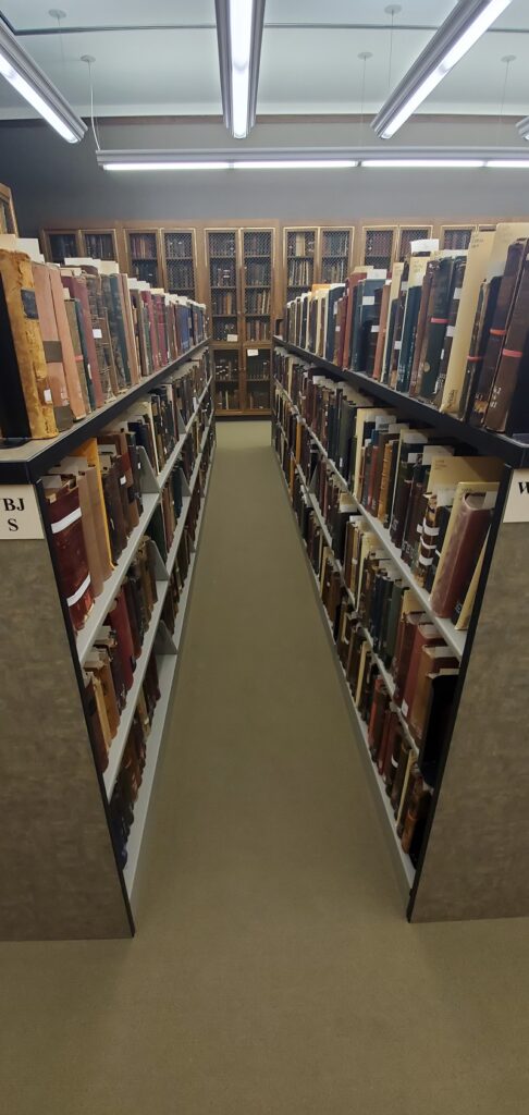 Every book on the shelves had to be removed, individually vacuumed, and returned to the shelf in order.