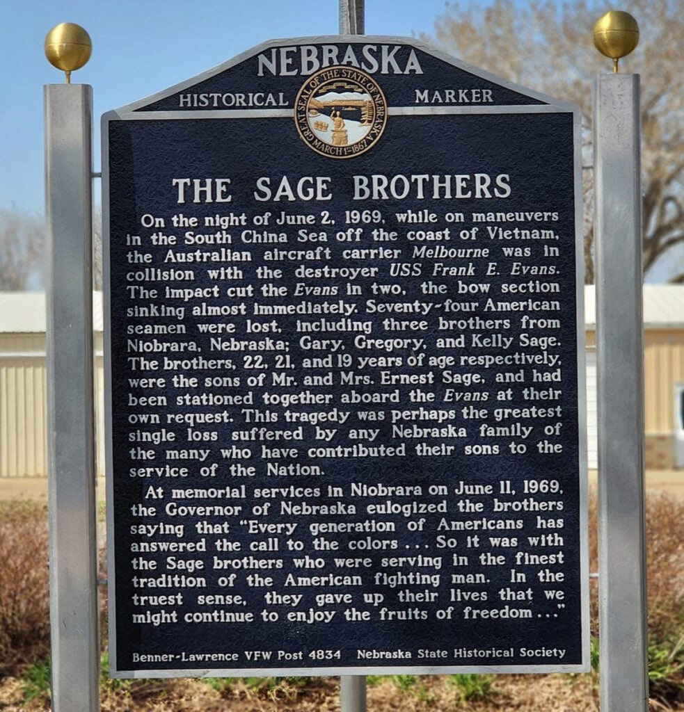 Nebraska Historical Marker titled "The Sage Brothers," detailing the loss of three Nebraska brothers on the USS Frank E. Evans in 1969 during the Vietnam War.