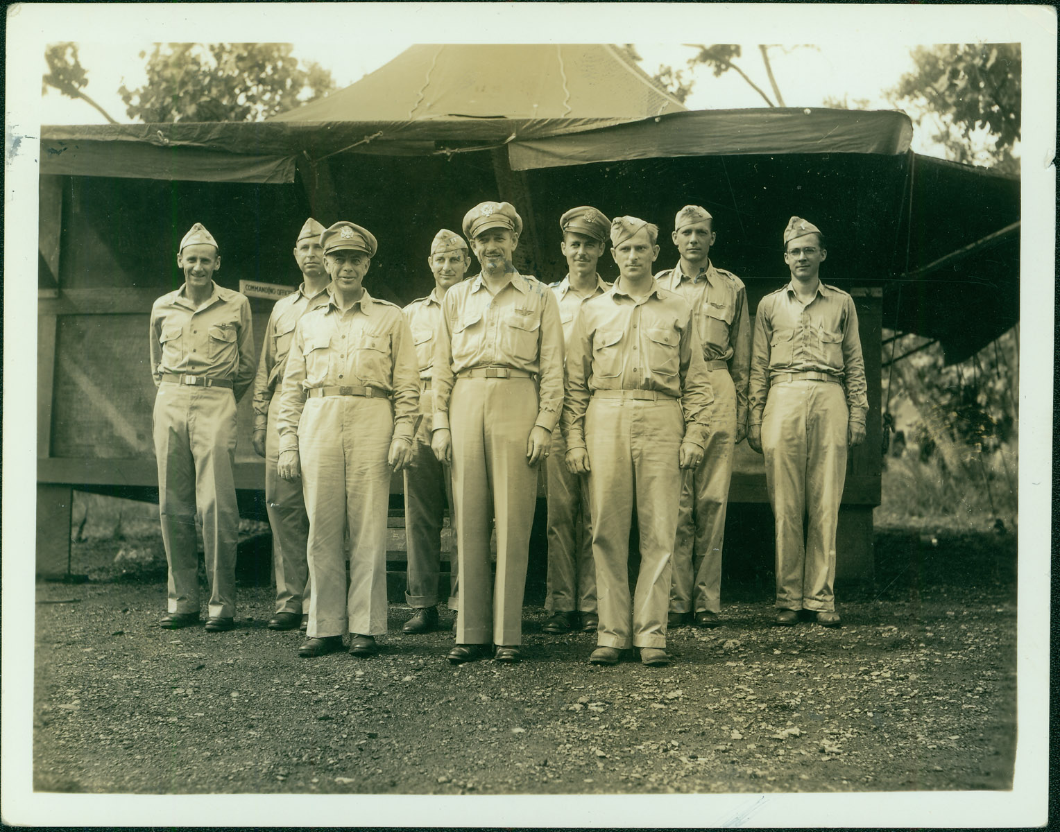 A group photo of Robert Merchant’s unit while stationed in the Pacific. Merchant stands at the far right. The officer far left, front row is Lt. Gen. George Kenney, Officer Commanding 5th Air Force. The first from the left in the back row is Colonel Ralph Koon and the fourth from the left in the back row is Lt. Colonel Art Rogers.