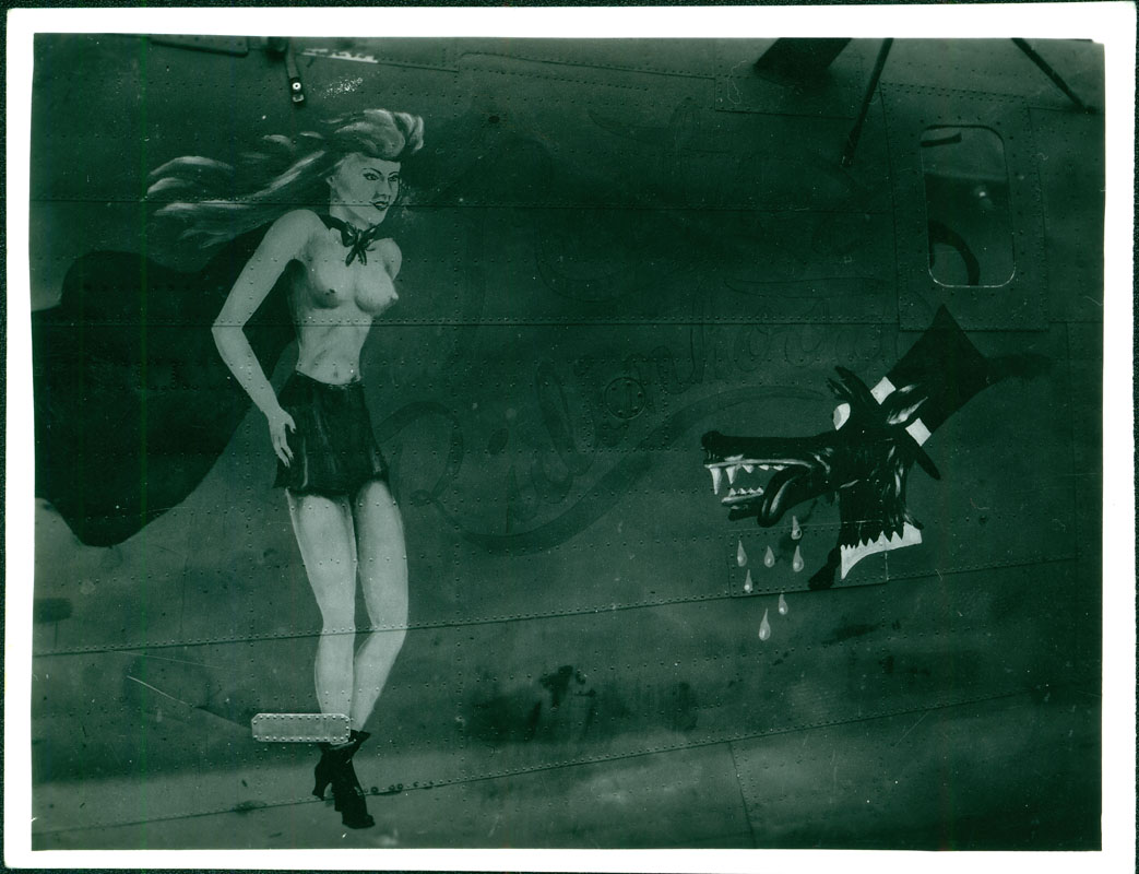 The Redhot Ridinhood - This nose art is a risqué reimaging of the 1943 cartoon character of the same name. The cartoon character was a nightclub singer and the big bad wolf clad in gentlemen’s attire.