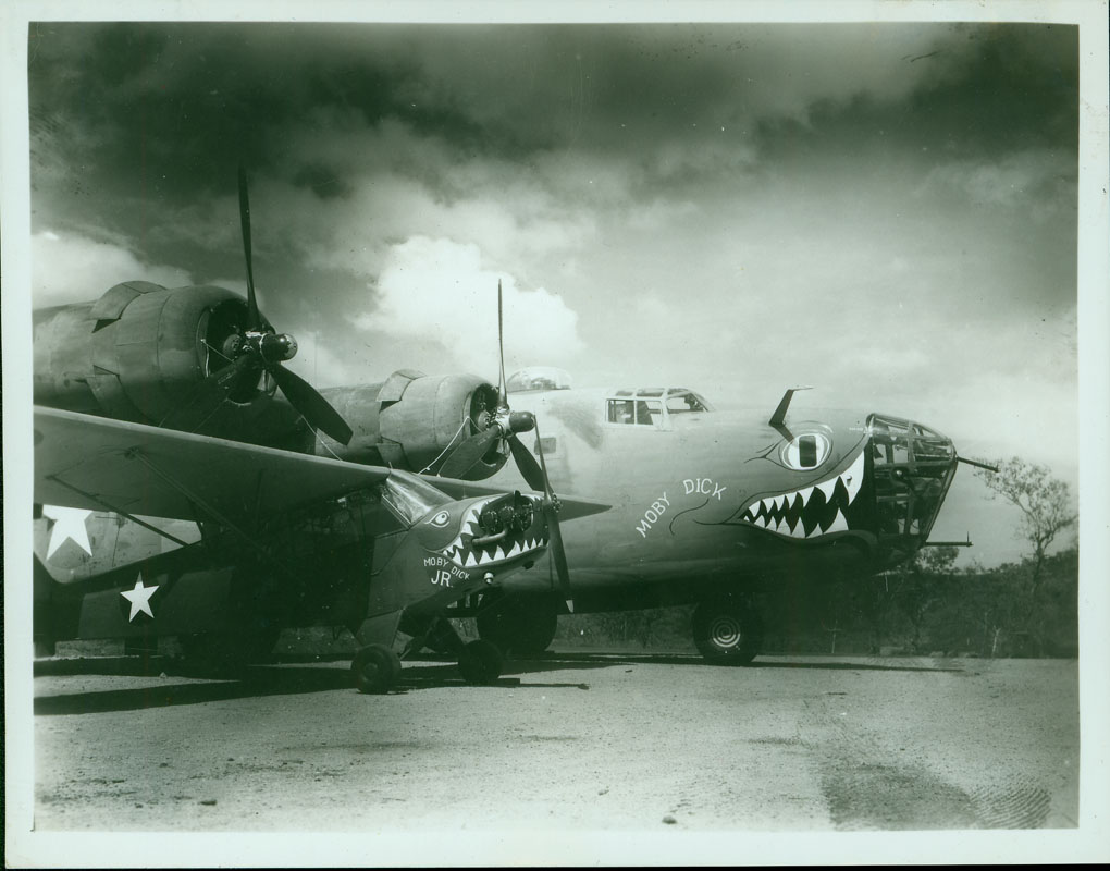Moby Dick and Moby Dick Jr. - This shows the two war planes, Moby Dick and Moby Dick Jr. on the ground. According to an uncredited source, both planes were part of the 320th Squadron, Whale Tale.
