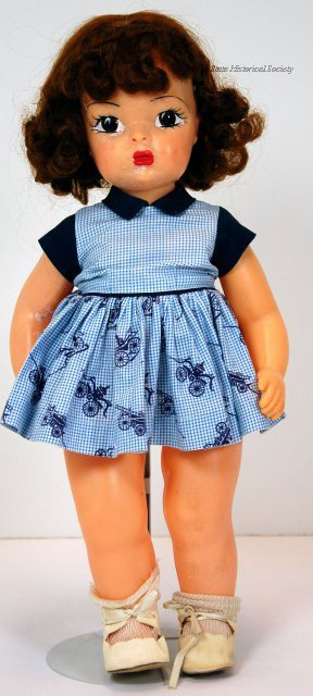 A Terri Lee Doll before it was housed in a new box. You can see white bloom on the dolls proper right arm.