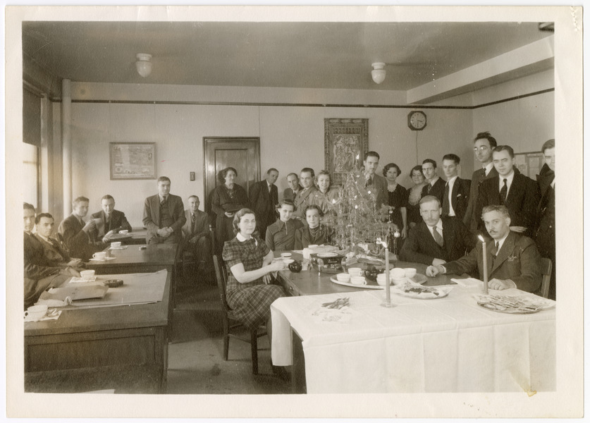 Black and white photograph of a holiday tea party for workers with the Federal Writers' Project in Nebraska, December 23, 1938.
