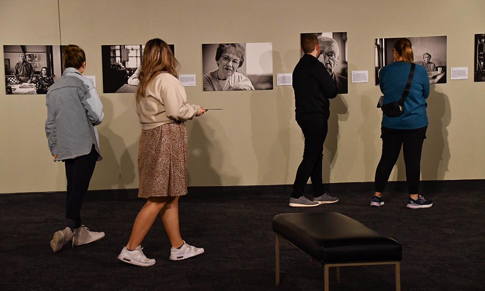 adults on a tour through the Nebraska history museum