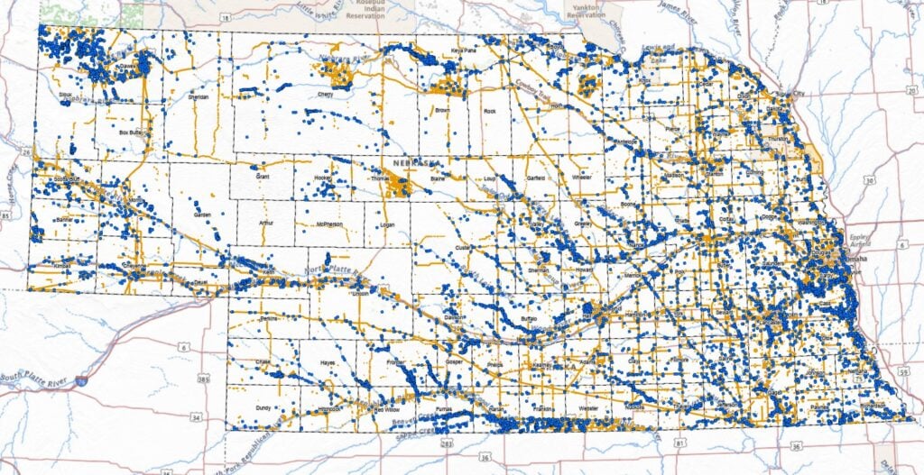 Map of Nebraska showing blue and yellow markings overlaid on a white background with county and road lines, highlighting geographic data distribution across the state.