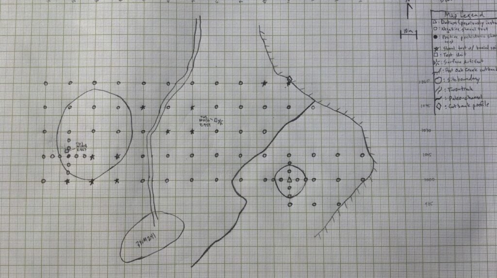 Hand-drawn map on graph paper showing dots, stars, circles, and irregular shapes with a key explaining symbols on the right side.