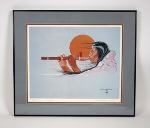Framed painting of a person with long hair playing a wooden flute, with an orange sun in the background and soft blue and gray tones throughout.