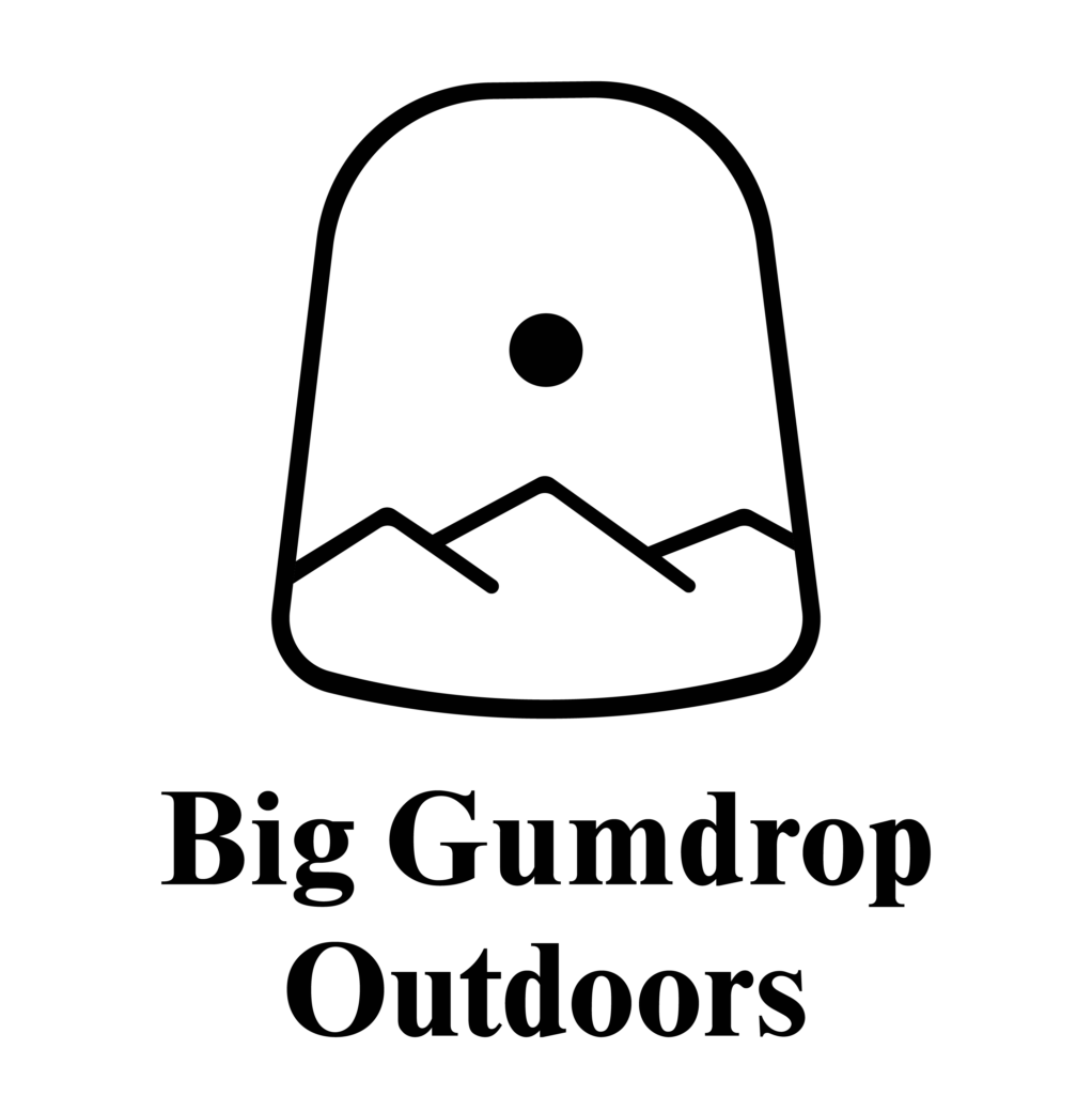 Black and white logo with a rounded shape resembling a gumdrop, a small circle above stylized mountains inside, and the text "Big Gumdrop Outdoors" below.