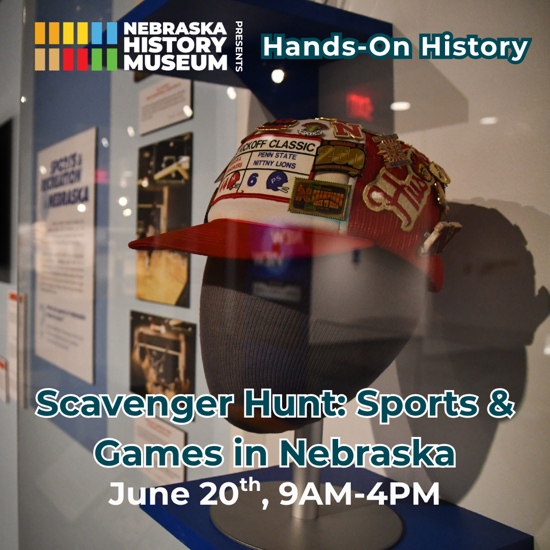 Hands-On History Sports and Games A display case with a sports-themed hat covered in pins; text promotes a scavenger hunt event at the Nebraska History Museum on June 20th, 9AM-4PM.