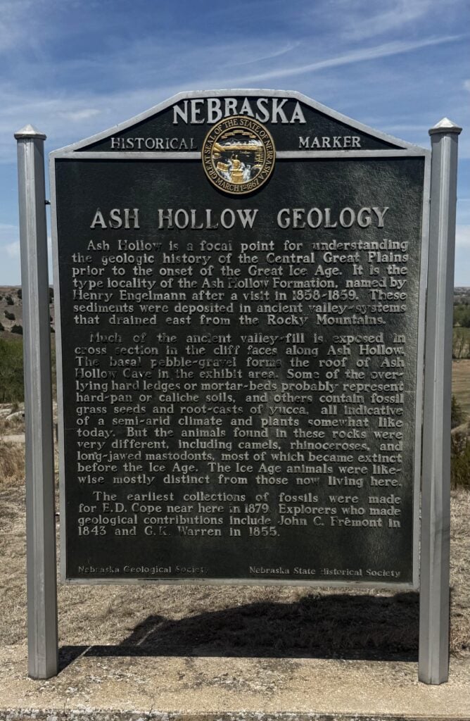Nebraska historical marker titled "Ash Hollow Geology," describing the area's geologic history and significance as a site of fossils and ancient valley fill.